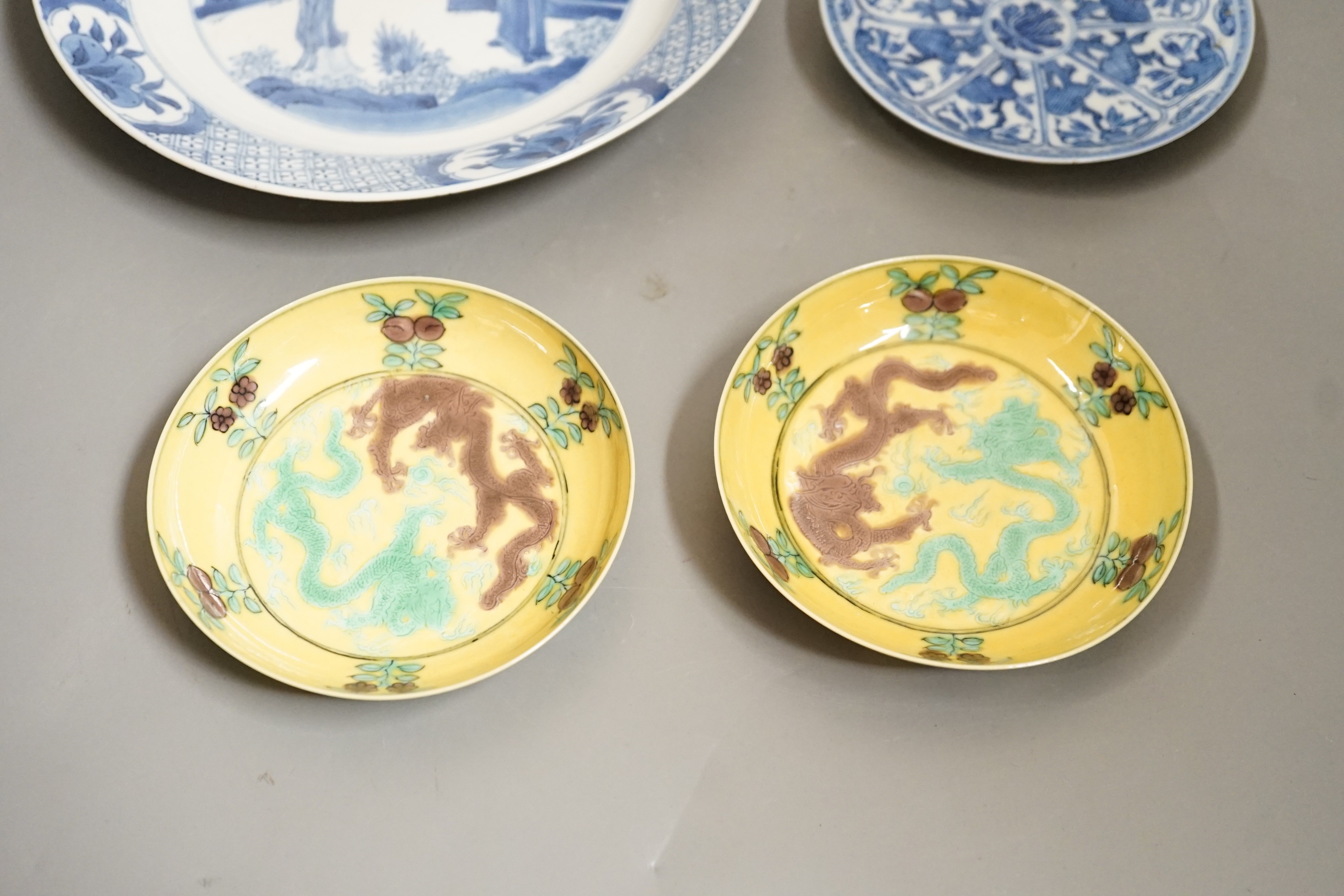 A pair of Chinese dragon dishes, a Kangxi blue and white plate, a Kangxi blue and white dish with chenghua mark